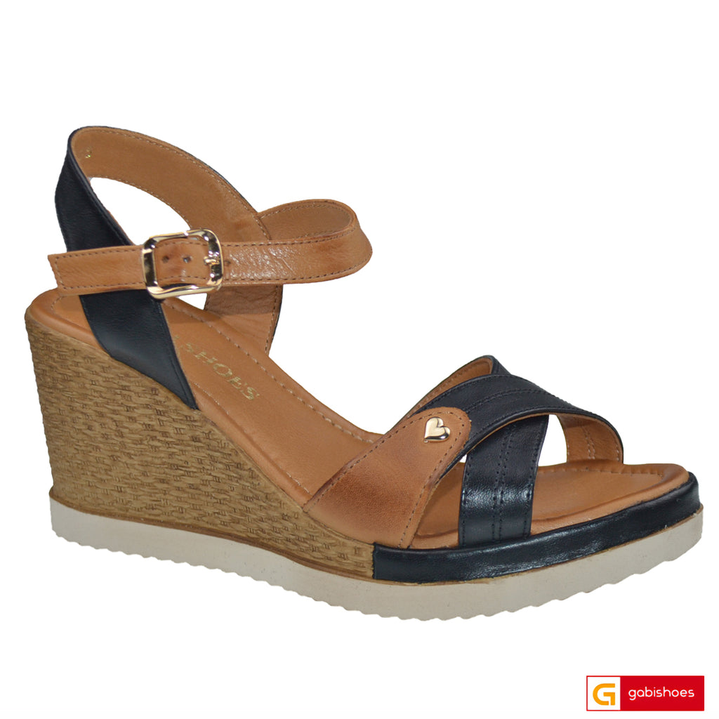Material: Piele Naturala&nbsp;
-Culoare: Negru cu maro
-Tip: Sandale
-Stil: Confort

- Sanda piele naturala maro cu negru
- Sanda cu burete special extra-confort&nbsp;
- Talpa bej , varf rotund, brant interior cu burete special mesina naturala&nbsp;
- Inaltime toc: 9 cm , platou de 2,5 cm
- Schimb gratuit
*Masuratori realizate pentru marimea 37