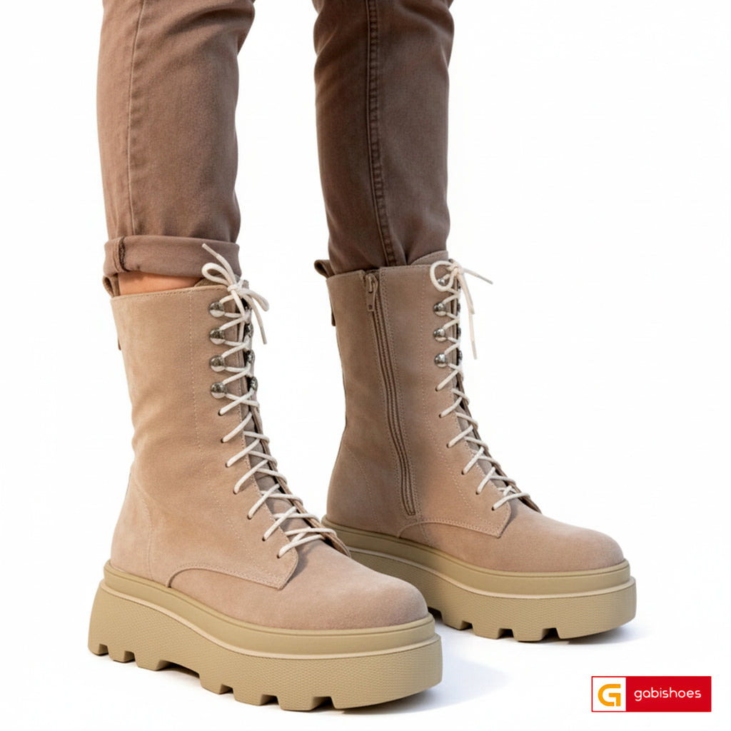 Material: Piele Naturala Intoarsa&nbsp;
Culoare: Capuccino
Tip: Bocanc
Stil: Casual

- Bocanci piele naturala intoarsa capuccino , ornamente argintii
- Bocanci cu fermoar si siret , inaltime 16 cm
- Talpa taupe, varf rotunt, brant interior cu burete special si blana interioara:mesina naturala complet +35 lei
- Schimb gratuit
* Masuratori realizeaza pentru marimea 37