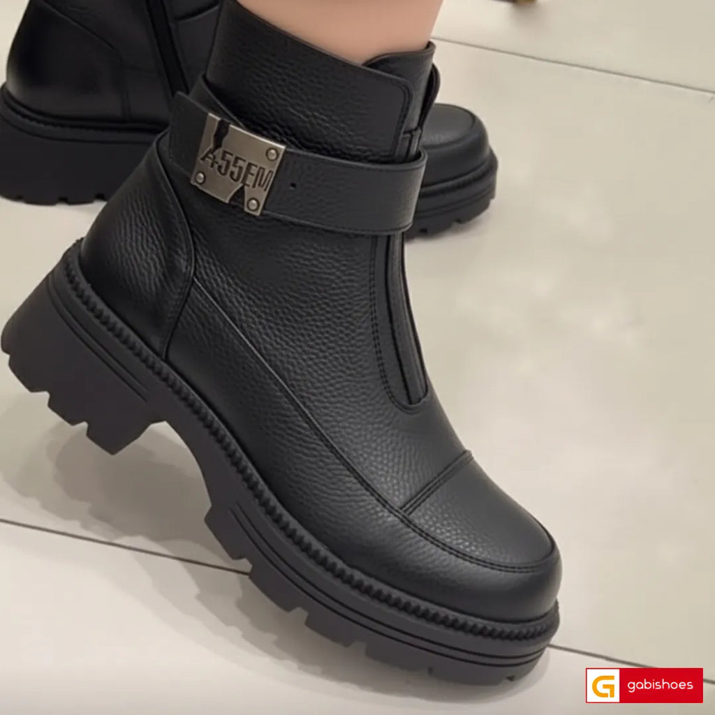 -Material: Piele Naturala&nbsp;
-Culoare: Neagra
-Tip: Ghete&nbsp;
-Stil: Casual

- Ghete piele naturala neagra cu fermoar si&nbsp; elastic
- Ghete cu fermoar si elastic, Toc inaltime 5 cm&nbsp;
- Talpa neagra , varf rotund , brant interior cu burete special,
- Schimb gratuit&nbsp;
* Masuratori realizate pentru marimea 37&nbsp;&nbsp;