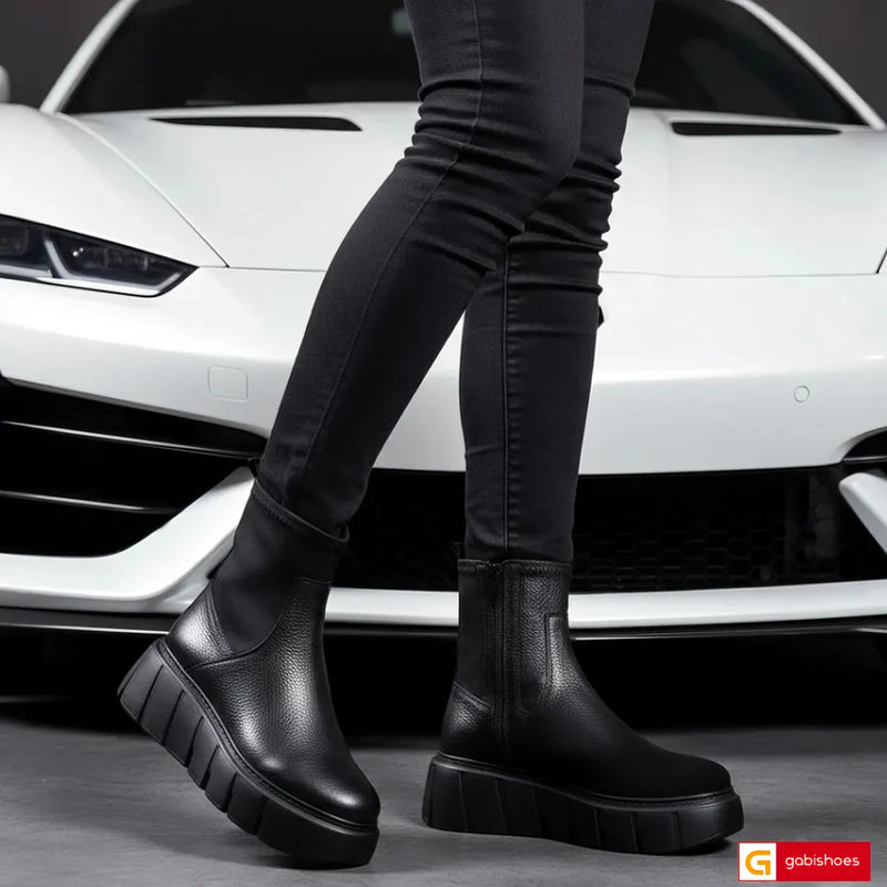 -Material: Piele Naturala neagra si strechi negru
-Culoare: Neagra
-Tip: Ghete streach
-Stil: Casual

- Ghete piele naturala neagra si&nbsp; streach negru ,inaltime de la talpa in sus 17 cm
- Ghete cu fermoar, Toc inaltime 6 cm&nbsp;
- Talpa neagra cusuta , varf rotund , brant interior cu burete special,
- Schimb gratuit&nbsp;
* Masuratori realizate pentru marimea 37&nbsp;&nbsp;