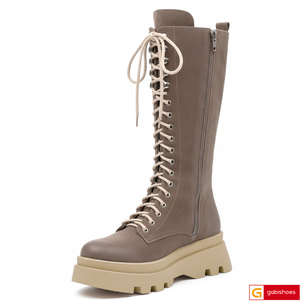 Material: Piele Naturala Intoarsa
Culoare: Taupe
Tip: Bocanc
Stil: Casual

- Bocanci piele naturala intoarsa taupe , ornamente argintii
- Bocanci cu fermoar si siret , inaltime 27 cm
- Talpa bej, varf rotunt, brant interior cu burete special si blana interioara
- Schimb gratuit
* Masuratori realizeaza pentru marimea 37